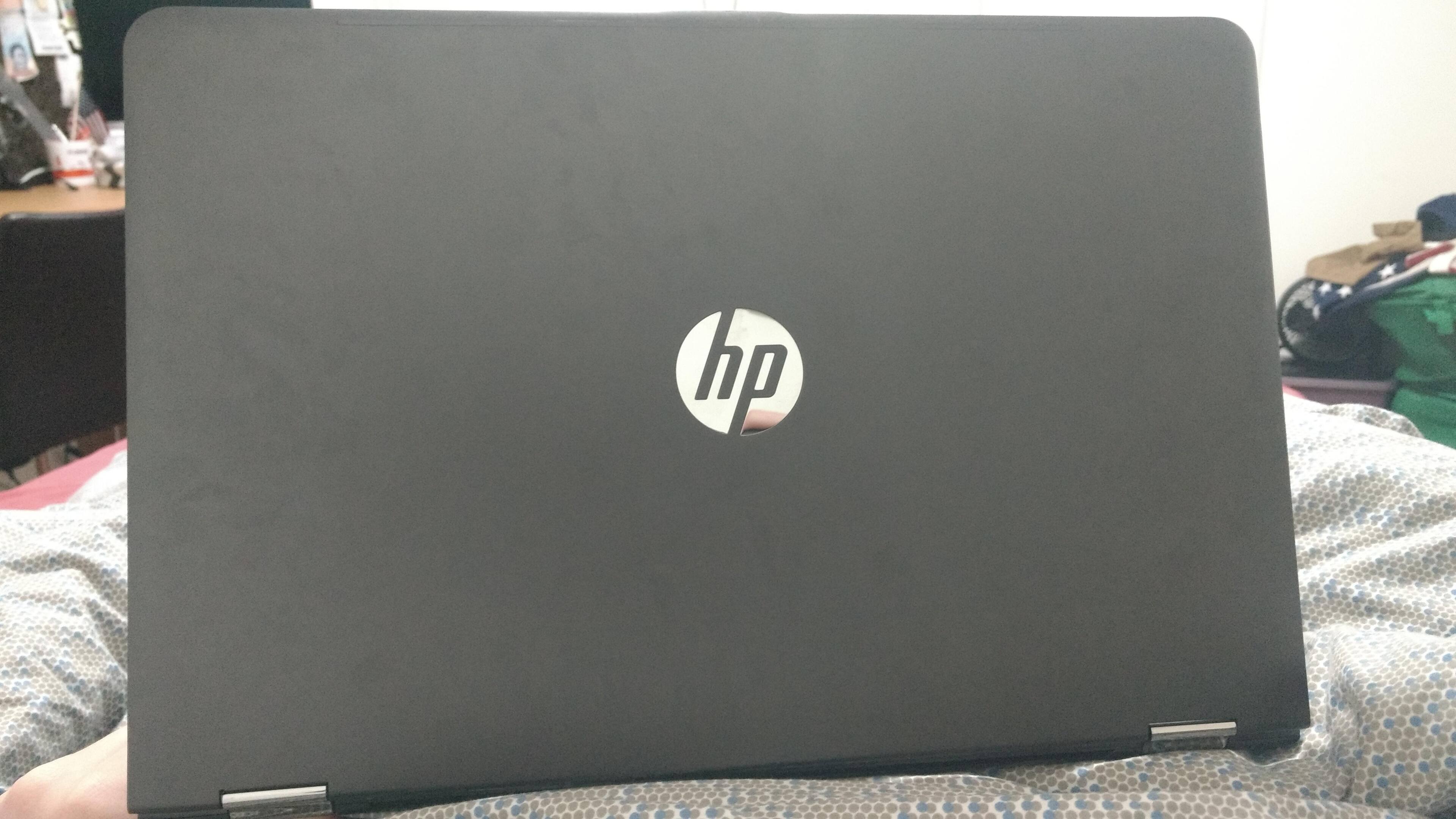The back of the laptop is black not grey, click to load a larger version