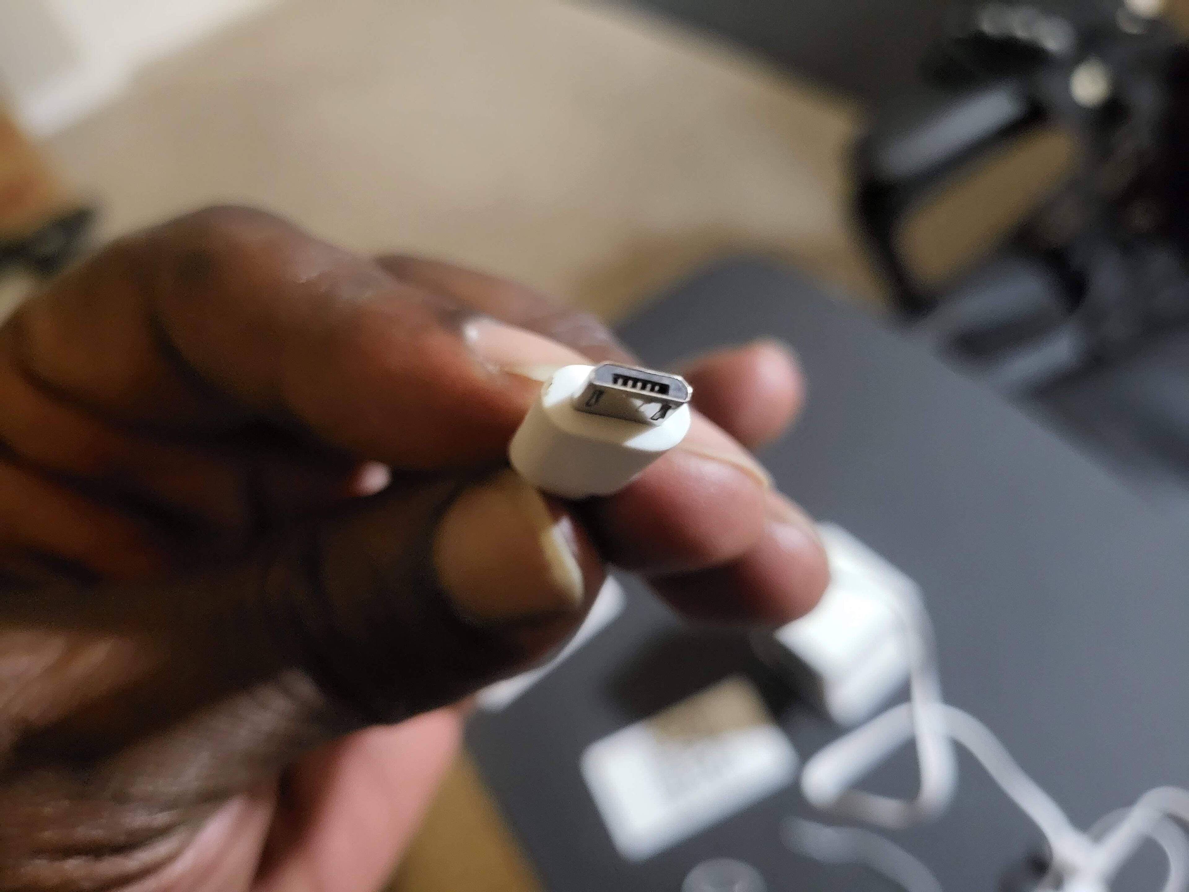 I do hate that the charger is using micro USB., click to load a larger version