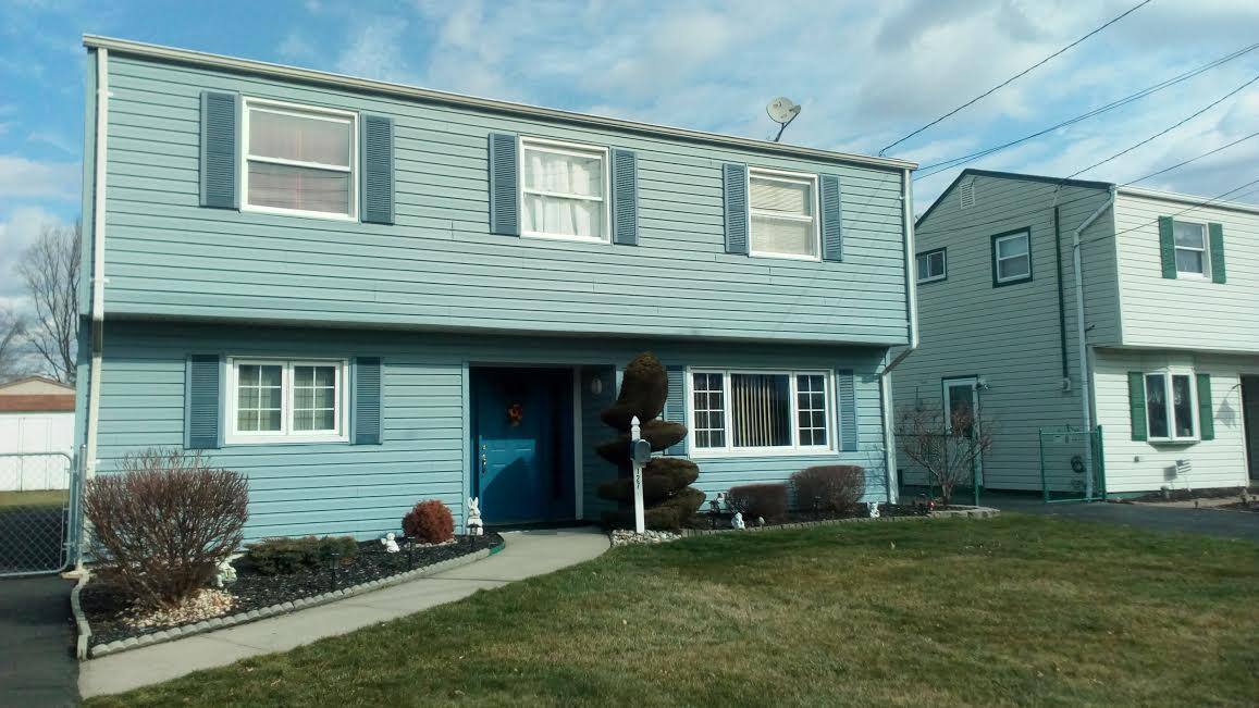 outside home, sunny day, click to load a larger version