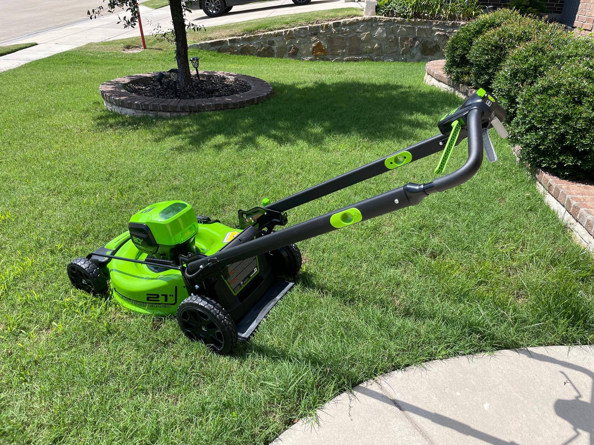 Mower, pre-cut. Adjustable handle on the mower makes it comfortable., click to load a larger version