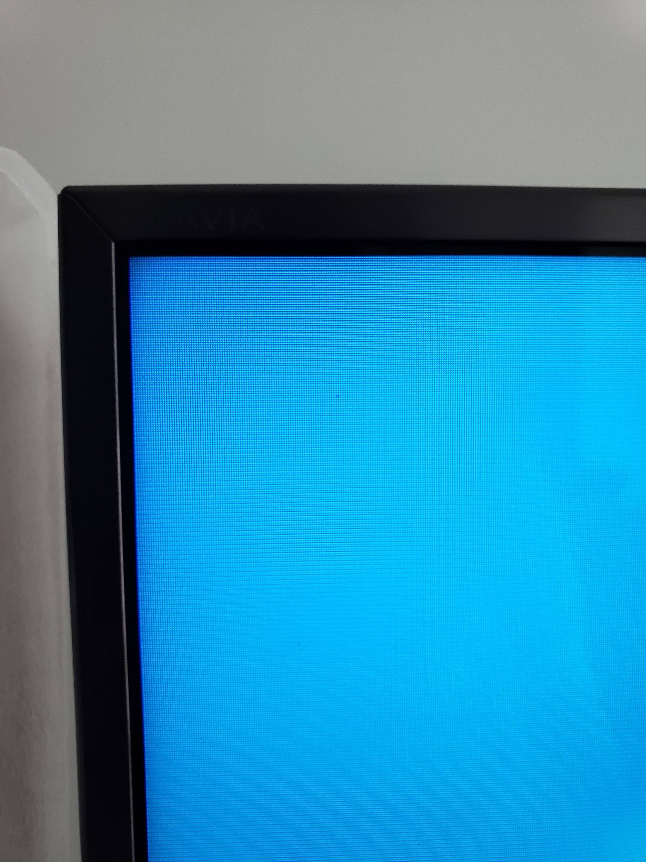 Dead pixel or dust at top left of screen., click to load a larger version