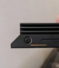 Pic of the stripped screw holding the heatsink in place. It's hard to tell since it's so tiny, but this used a six pointed bit and not a phillips head or flathead., click to load a larger version