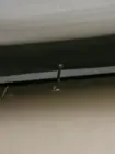 Nail stuck in the cardboard protector for the screen., click to load a larger version