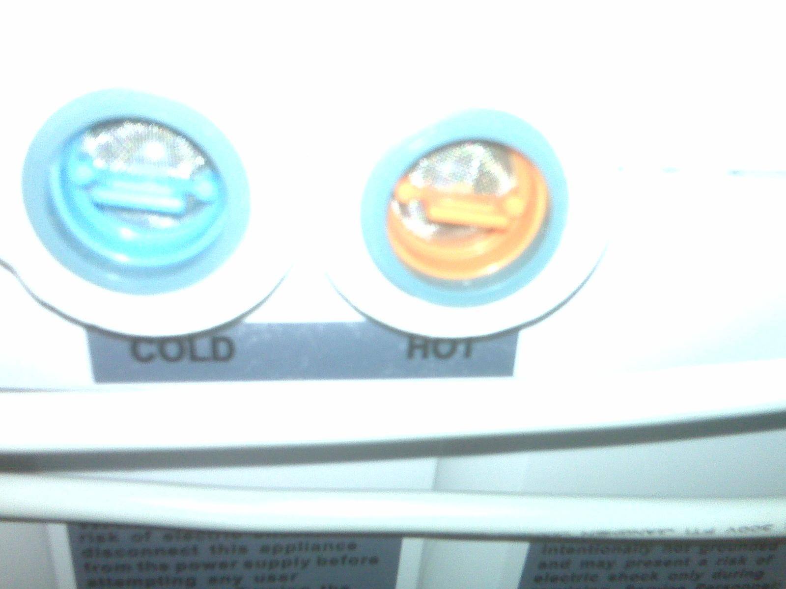 Hot/cold water inlets on back of machine, click to load a larger version