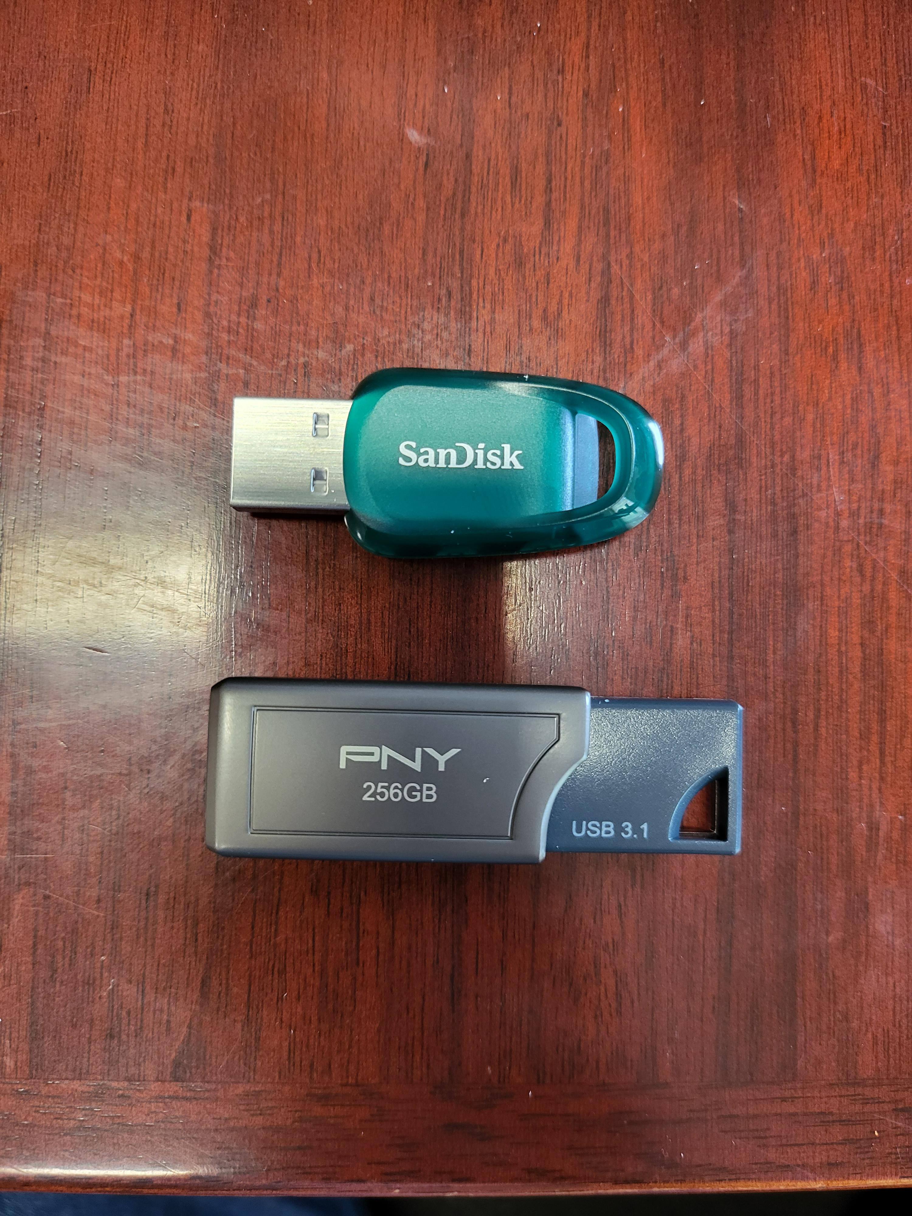 Eco friendly next to "traditional" sized USB thumb drive, click to load a larger version
