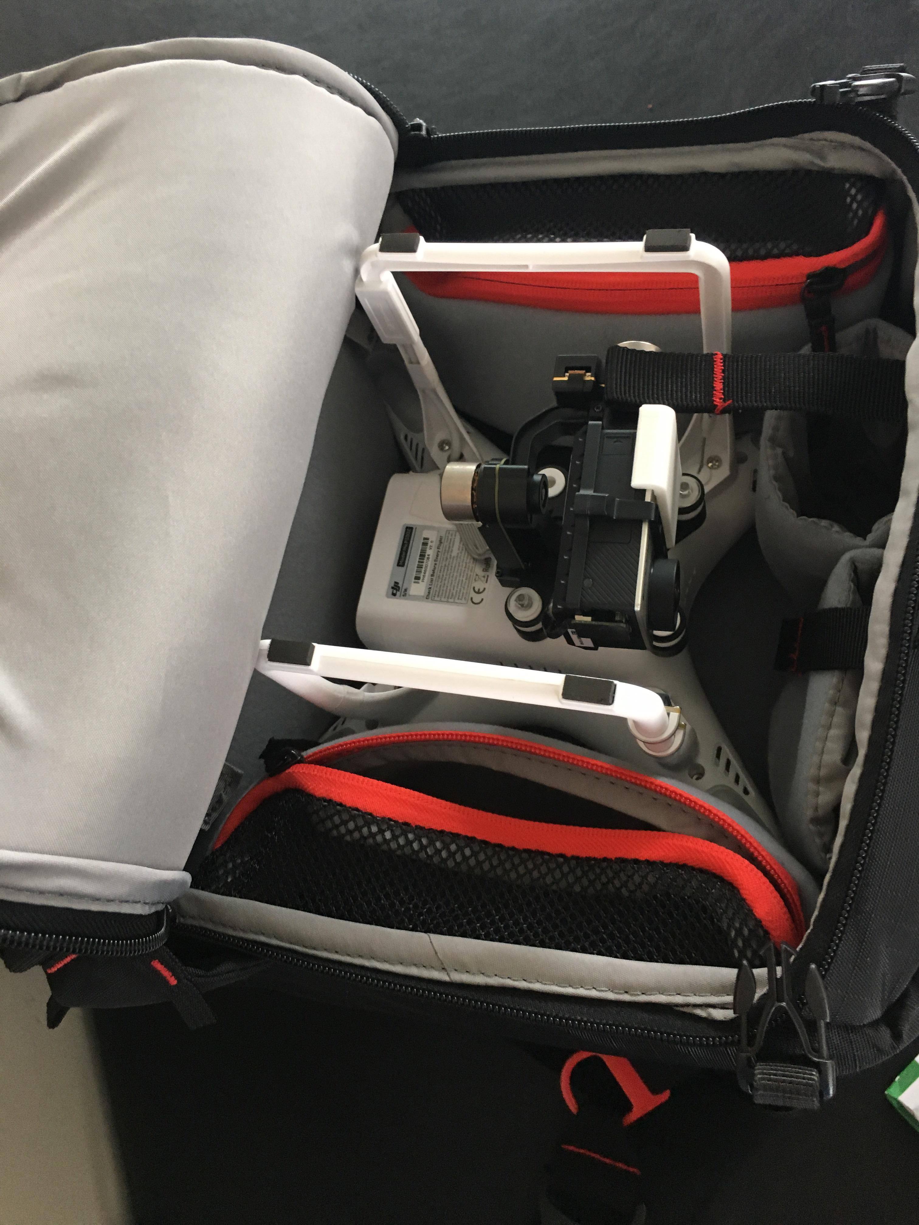 The bottom of the bag is used for the quad itself. This area also holds chargers, 6+batteries (I only have two), and some more space along the sides for storage., click to load a larger version