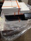 Printer all packaged up with tape, click to load a larger version