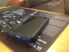 Soft rubber strand below home button., click to load a larger version