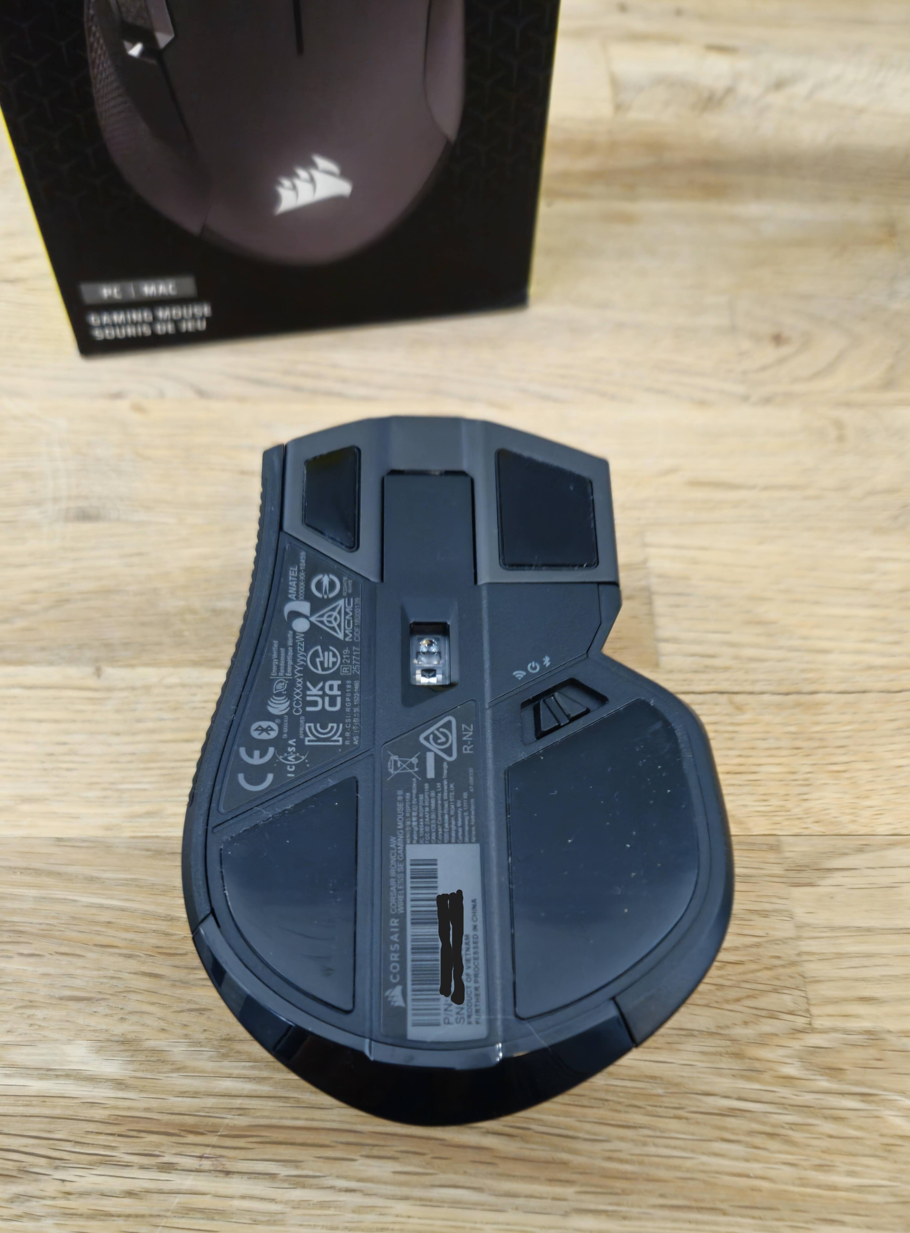 The bottom slide pads make the mouse glide smoothly across almost any surface.  Plus, with surface calibration you can easily adjust the mouse to work on almost any surface., click to load a larger version