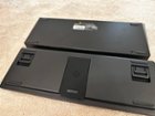 The bottom keyboard is the Apex Mini, with the kickstand and the compartment for the key removal tool, click to load a larger version