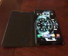 Note 8 in factory Samsung flip case., click to load a larger version