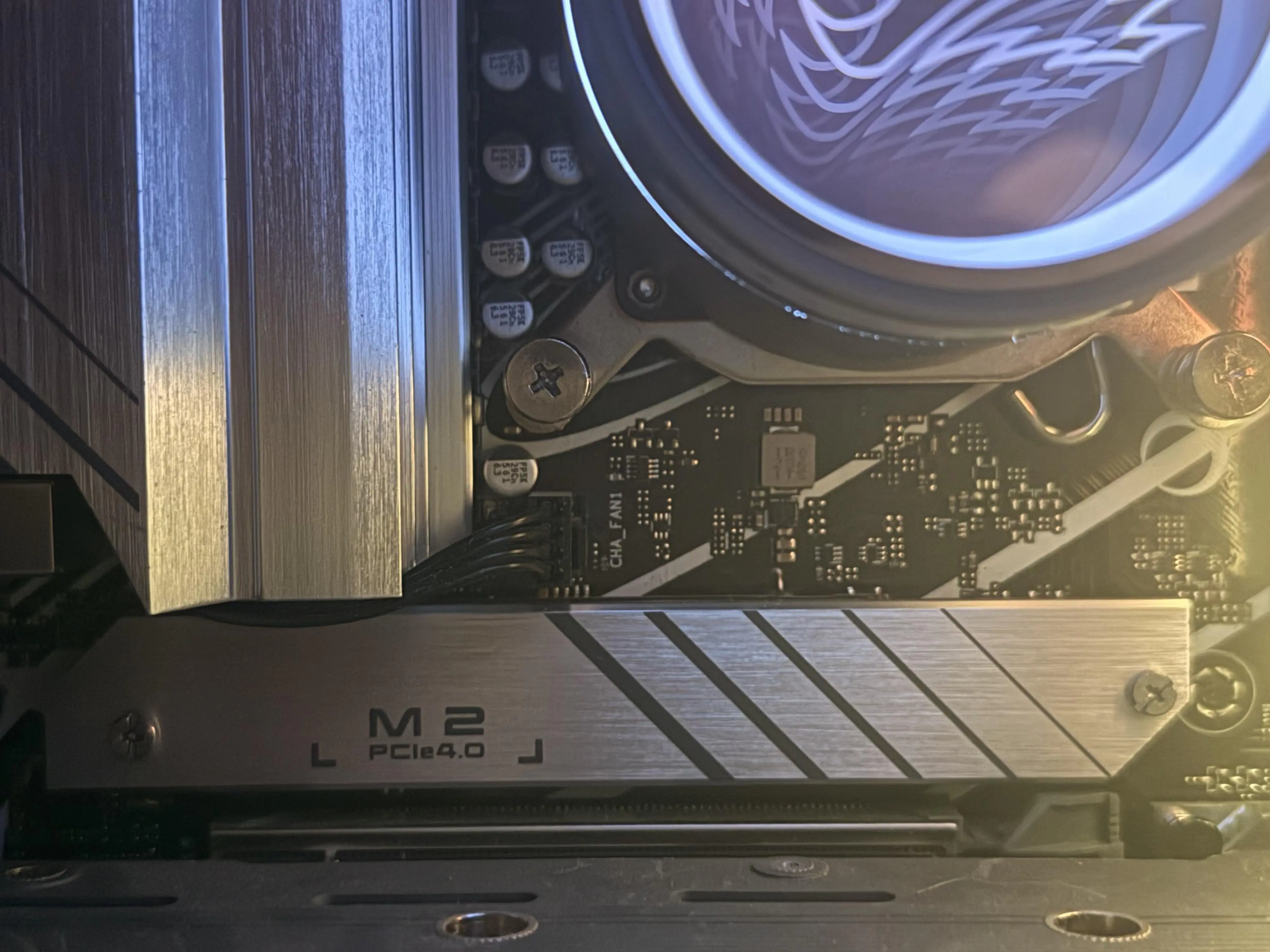 Mounted behind my Asus motherboard heatsink, click to load a larger version