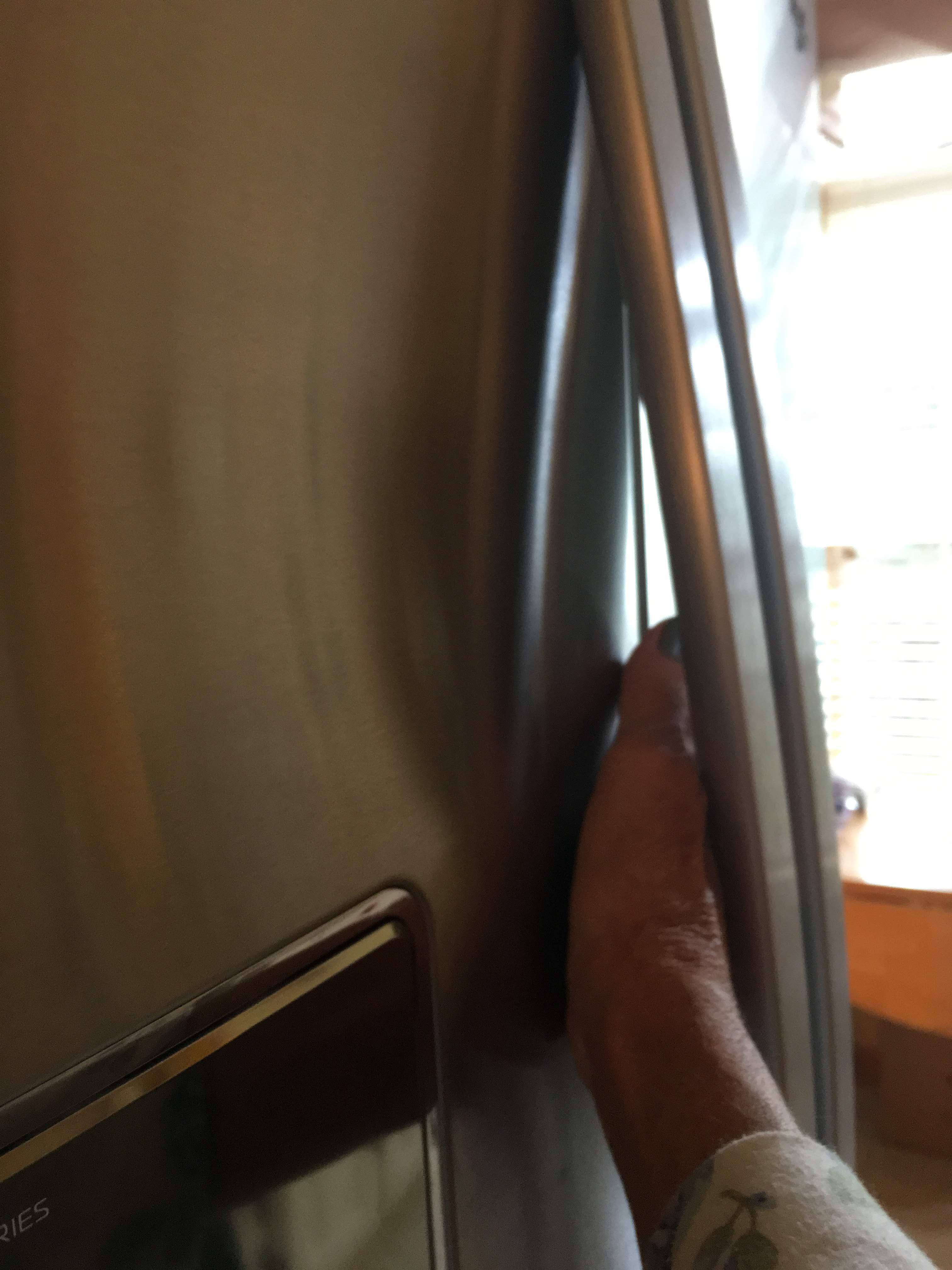 hard to fit hand behind handles to clean finger prints, click to load a larger version