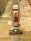 The Hoover Floormate Deluxe Hard Floor Cleaner posing with my beautiful quartizite floor. Thanks Hoover!, click to load a larger version