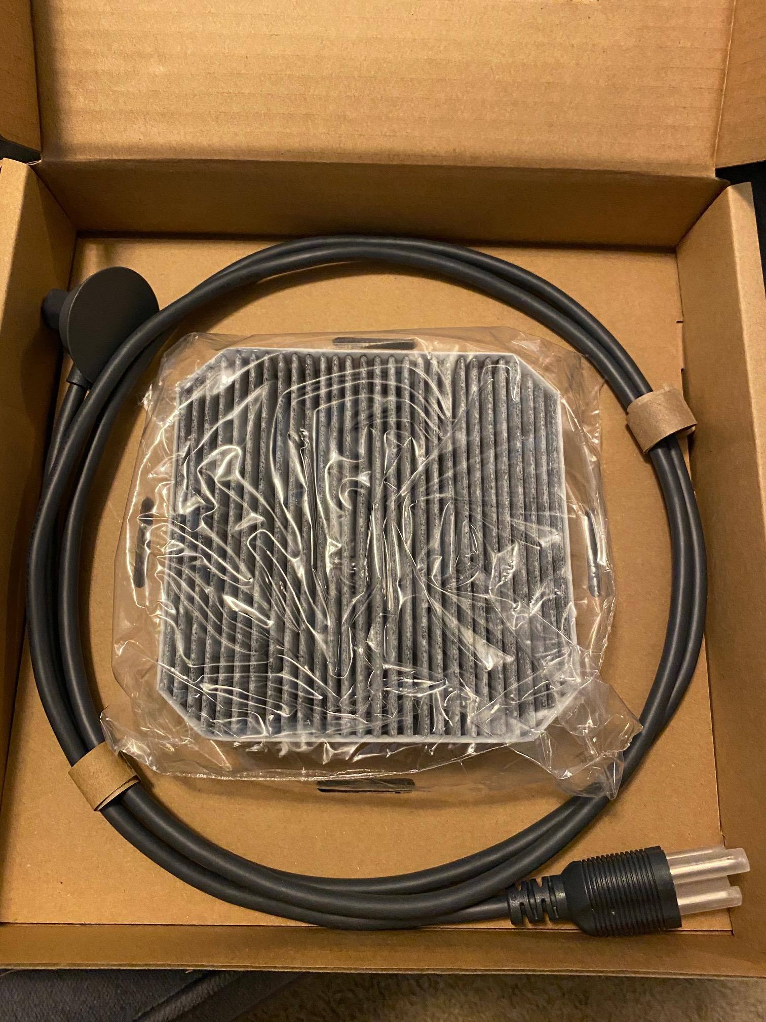 included power cable and extra filter, click to load a larger version