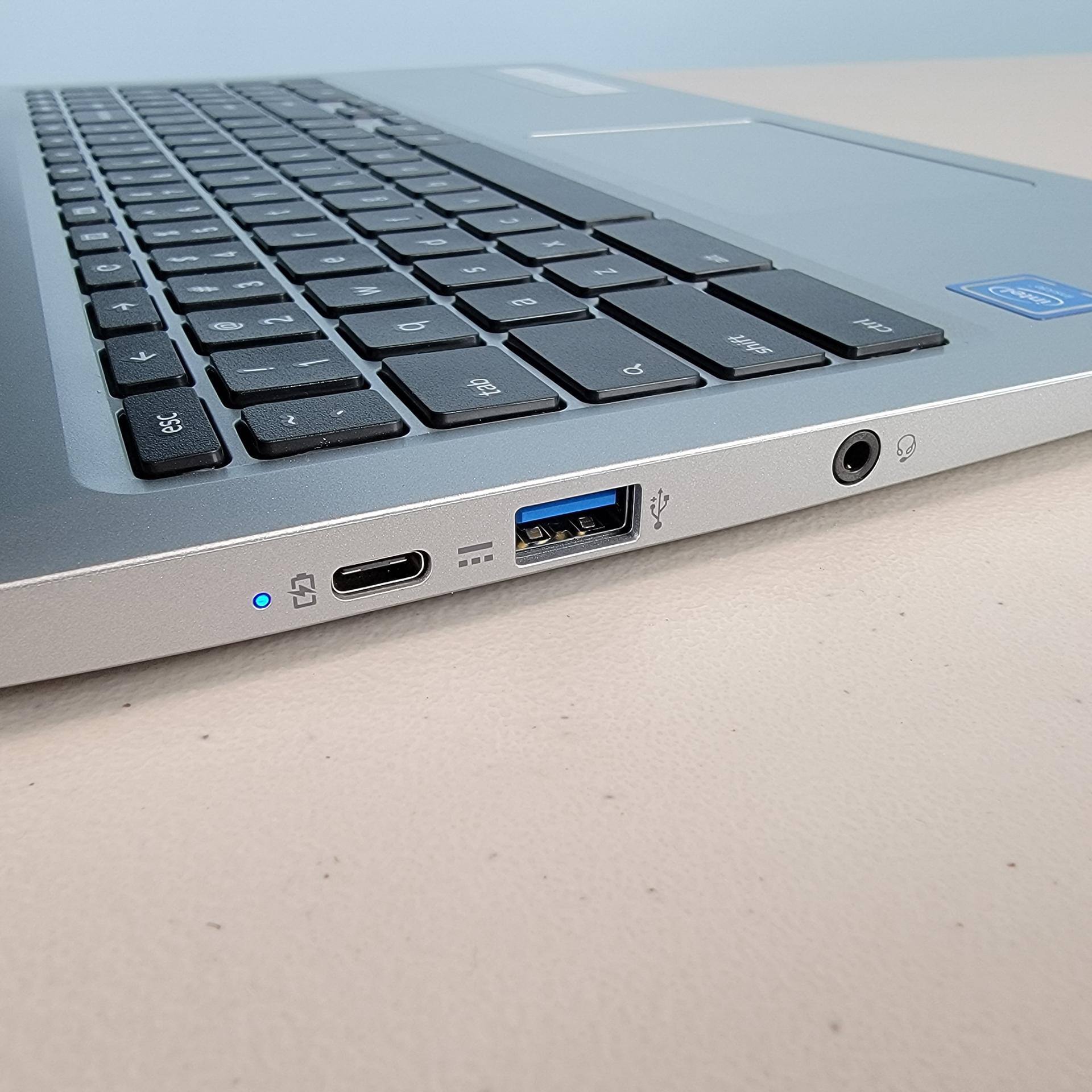 Left side view, USB-C charging/data port, USB-A peripheral port, 3.5mm mic/headphone jack, click to load a larger version