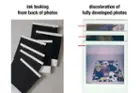 Film Pack Defects: Ink leaking from back of photos, and discoloration on the top of the fully developed photos., click to load a larger version