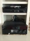 Netgear N750 is atop BluRay player on 2nd shelf, click to load a larger version