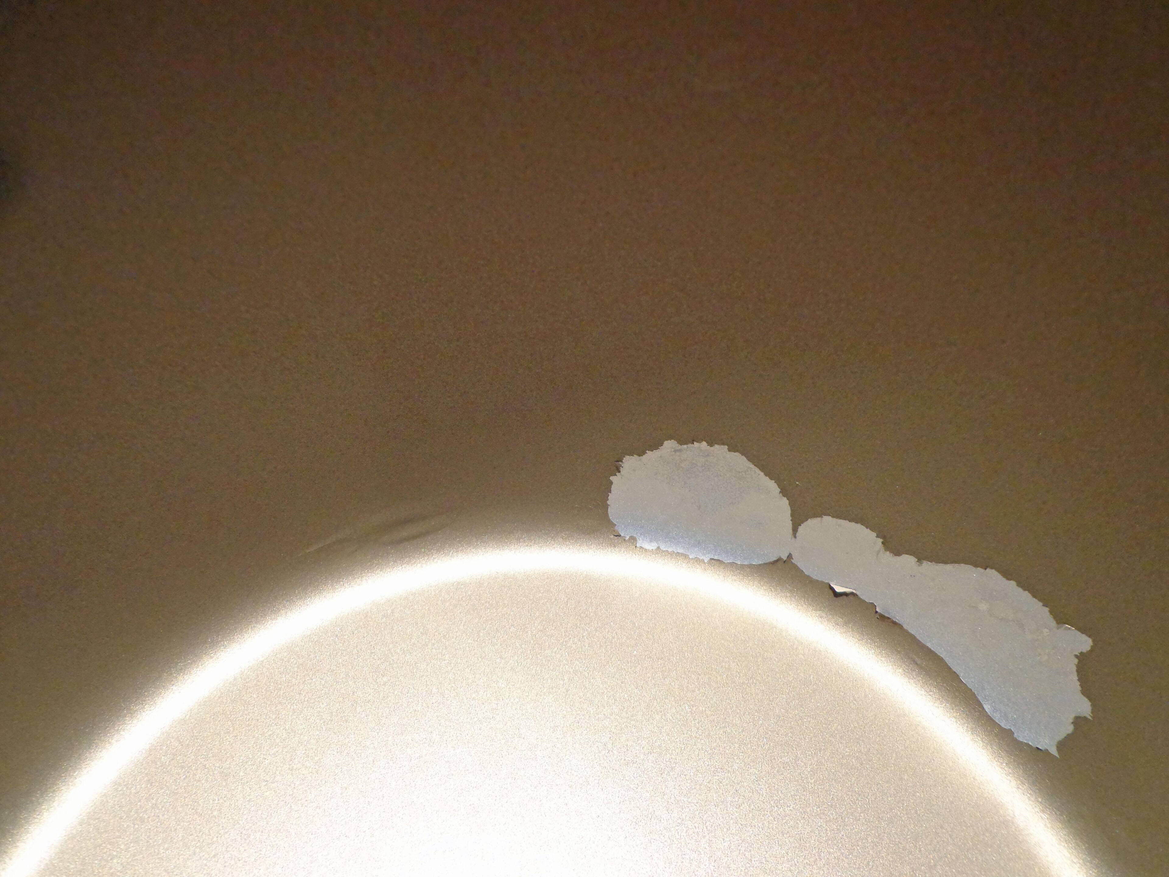 Bubbling to the left will soon peel away too. This is also seen further up on the sides of the pot, but not so severe., click to load a larger version