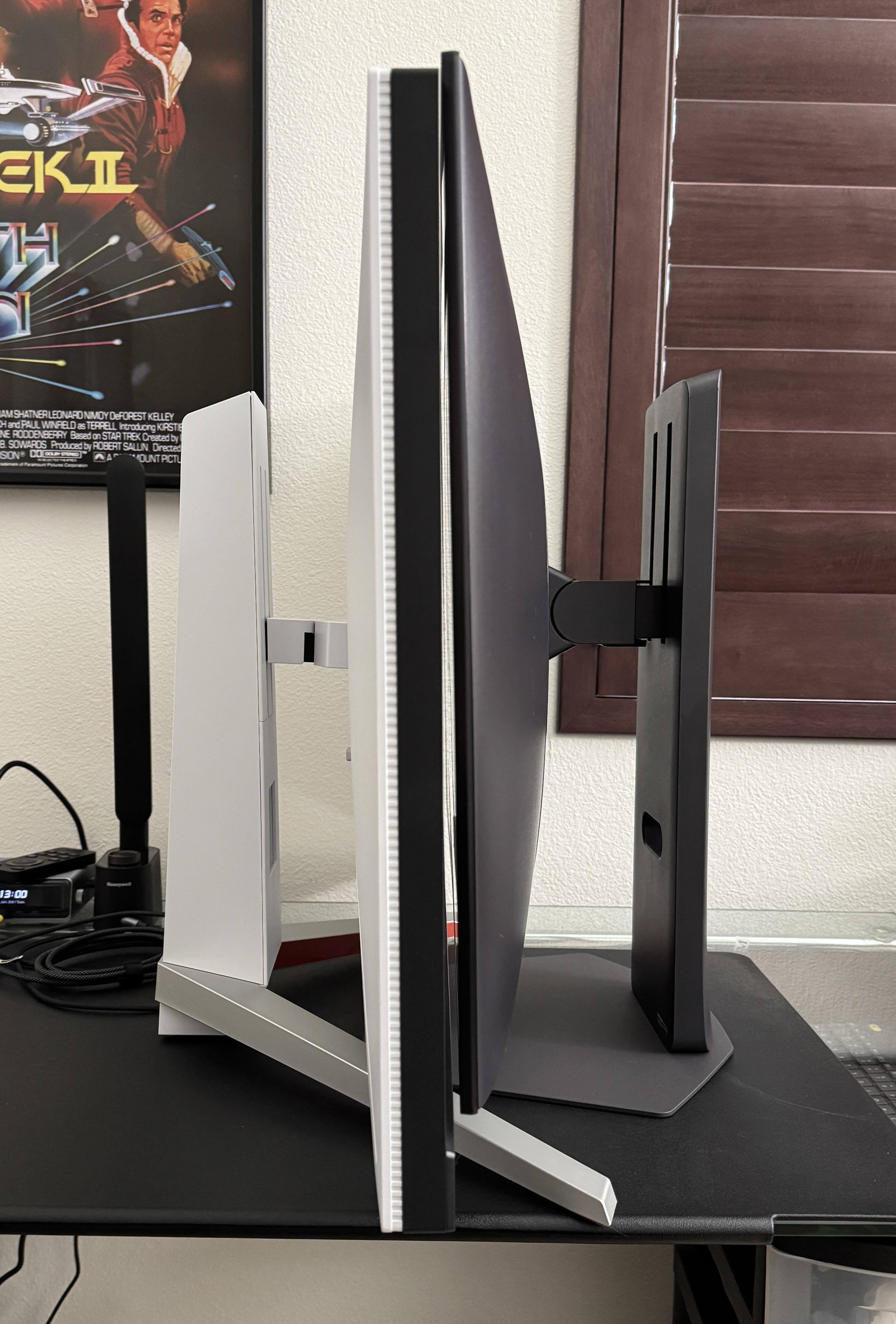 Thin and has a great stand that doesn't get in the way., click to load a larger version