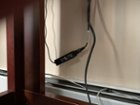 Adapter hangs from the too-short power cord., click to load a larger version