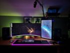 The black levels will make you ashamed every display in your setup isn't an OLED. The RGB lighting looks glorious against the wall. I stuck a little 3D engraved paperweight under the display and it's perfectly lit up by the bottom LED., click to load a larger version