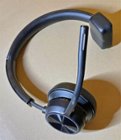 It's not "tiny" but it is comfortable, with an adjustable head band and the ability to use on either ear by flipping the mic boom around. Padded earpiece feels nice and sound/battery life are good., click to load a larger version