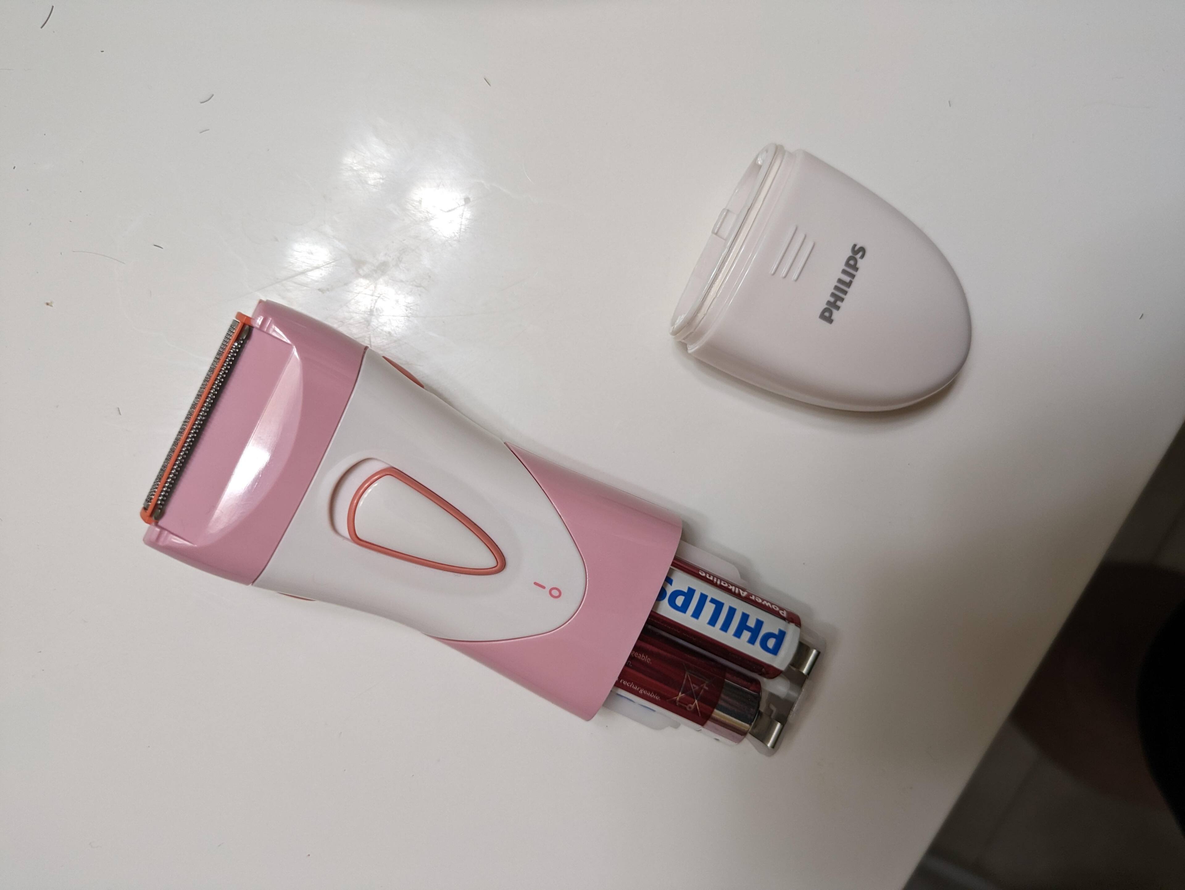 Showing the battery compartment removed where the AA batteries go. Again, I wish it was rechargeable, but I understand the economic decision, click to load a larger version