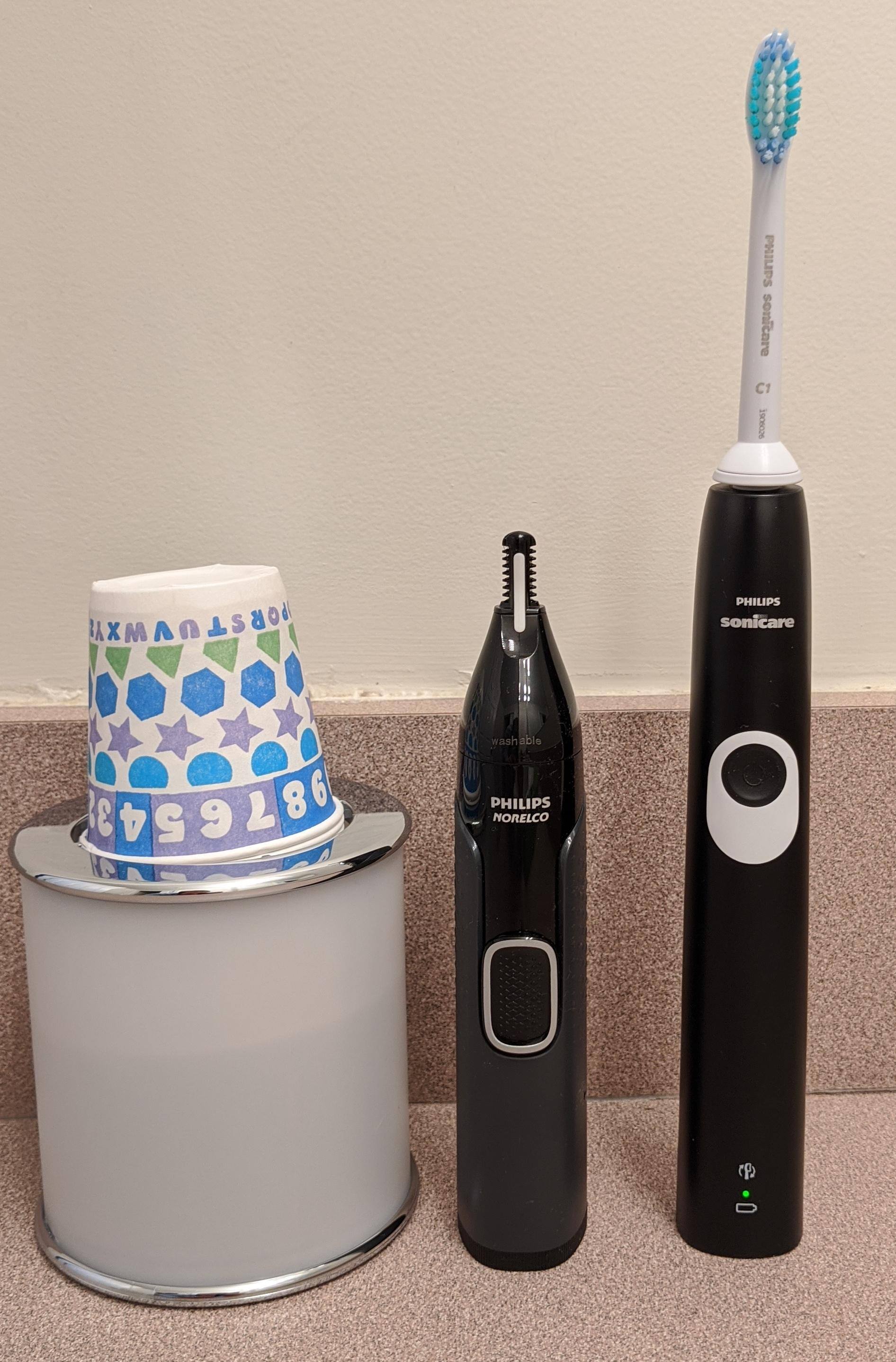 Shorter and about as round as an electric toothbrush, the trimmer is very portable., click to load a larger version
