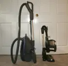 Compared to a typical canister vacuum (left), the MultiFLEX IF281 is absolutely diminutive., click to load a larger version