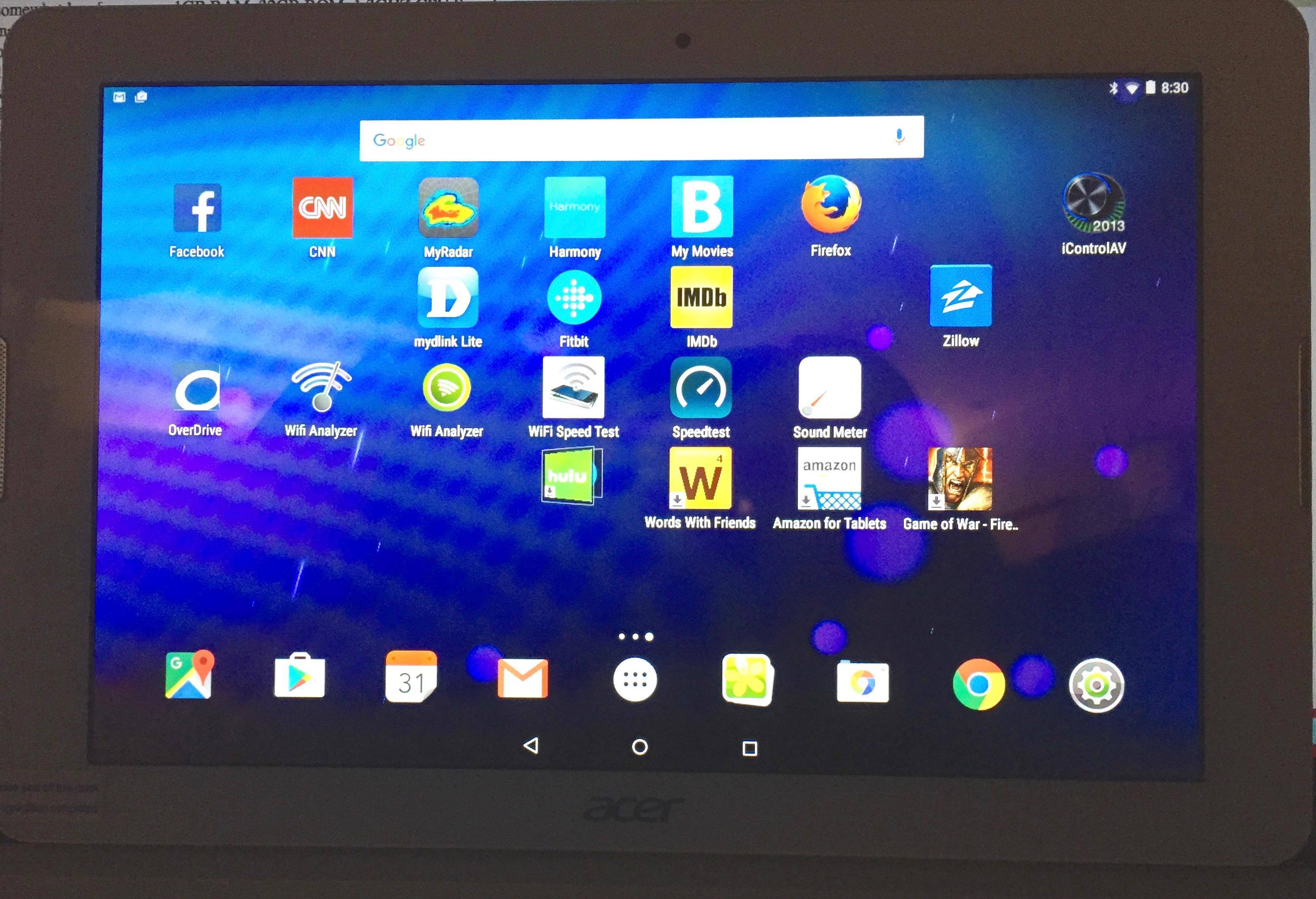 Acer Iconia One: it's white but picure was shot in the dark., click to load a larger version