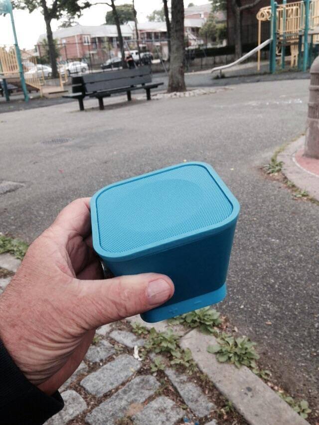 Using my blue tooth speaker at the playground., click to load a larger version