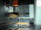 Grounds sometimes get caught in back blocking the tray. The cleanup tool doesn't get them and fingers don't fit. A vacuum with a crevice tool easily fixes this., click to load a larger version