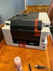 The rear side of the printer with the packing tape, click to load a larger version