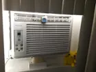Installed by my apartment complex, the provided shelf and all that was needed for window installation., click to load a larger version