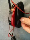 The edge of the pad is only held in by the red indent, click to load a larger version