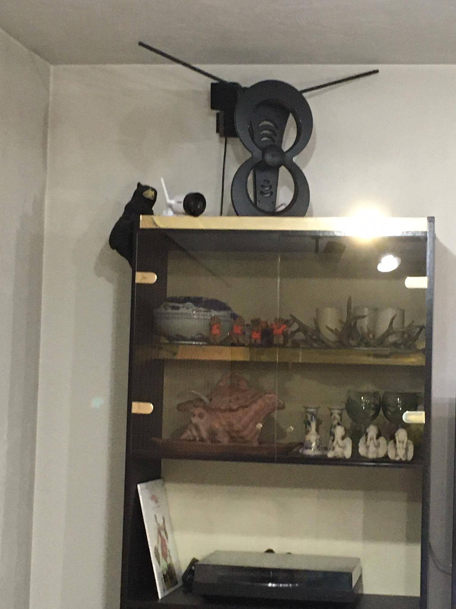 Defender Guard Camera - Living Room On Top Of Cabinets, click to load a larger version