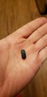 Incredibly small rubber mic port plug, which will likely be lost in the first 15 minutes of ownership., click to load a larger version