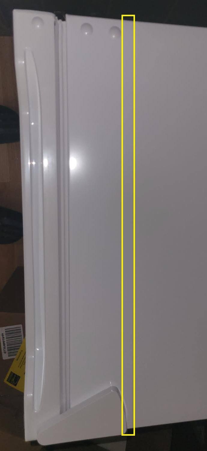 Clear (anti-scratch?) film on the top  of the fridge, click to load a larger version