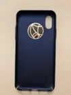 Metal disc in back of phone case., click to load a larger version
