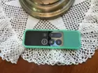 This is the remote with a protective cover that I bought on Amazon for about $10 ... it even glows in the dark! (The first one broke so easily.), click to load a larger version