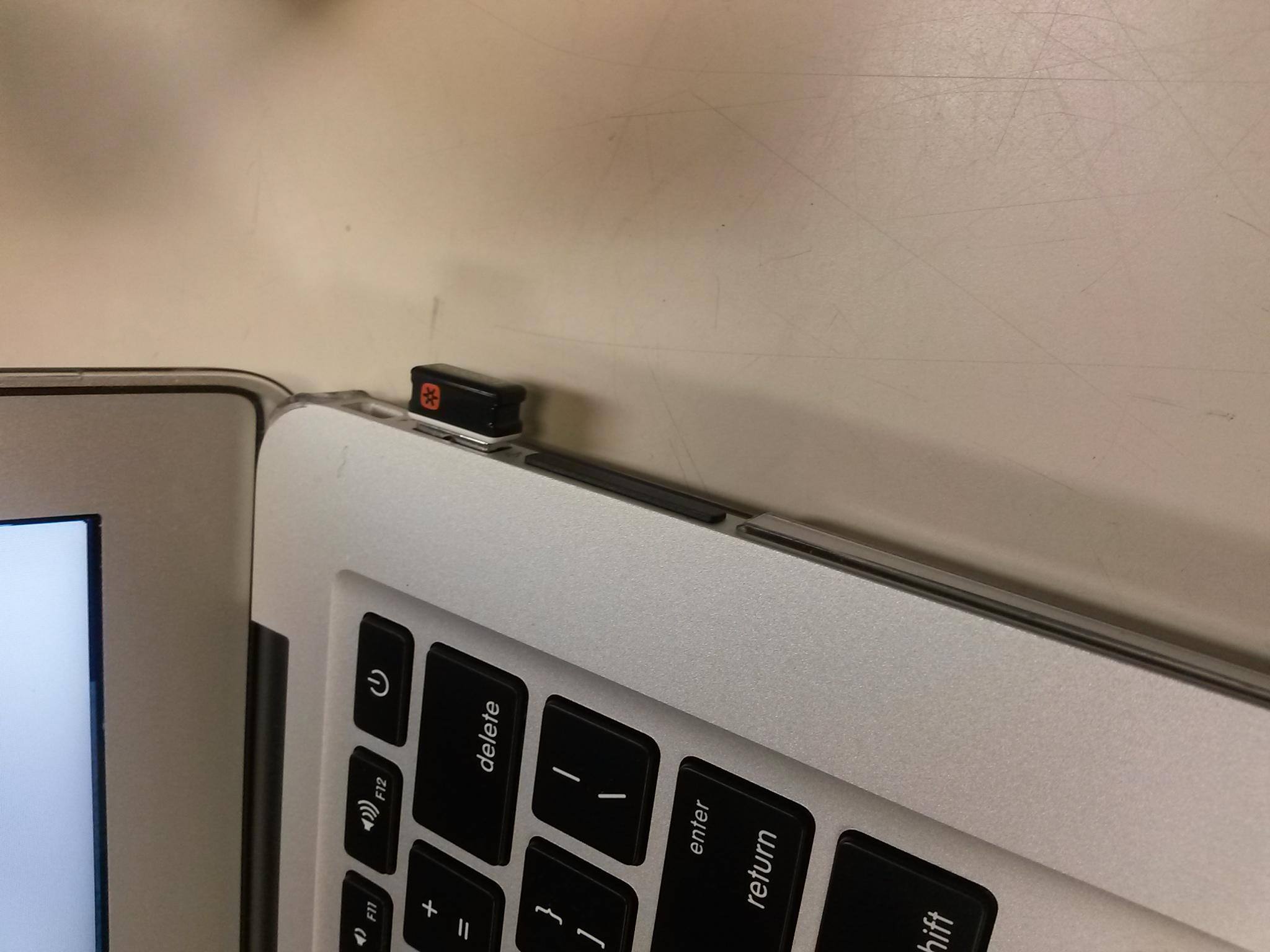 This shows how the drive does not stick out too far from the computer., click to load a larger version