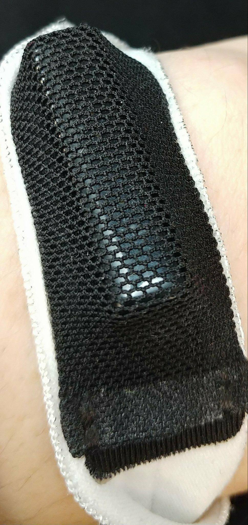 Here's how the tracker sits in the mesh pouch. Very secure., click to load a larger version