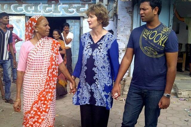 Saroo Brierly with his foster mother Sue and his biological mother in Khandwa. Courtesy Saroo Brierley, click to load a larger version