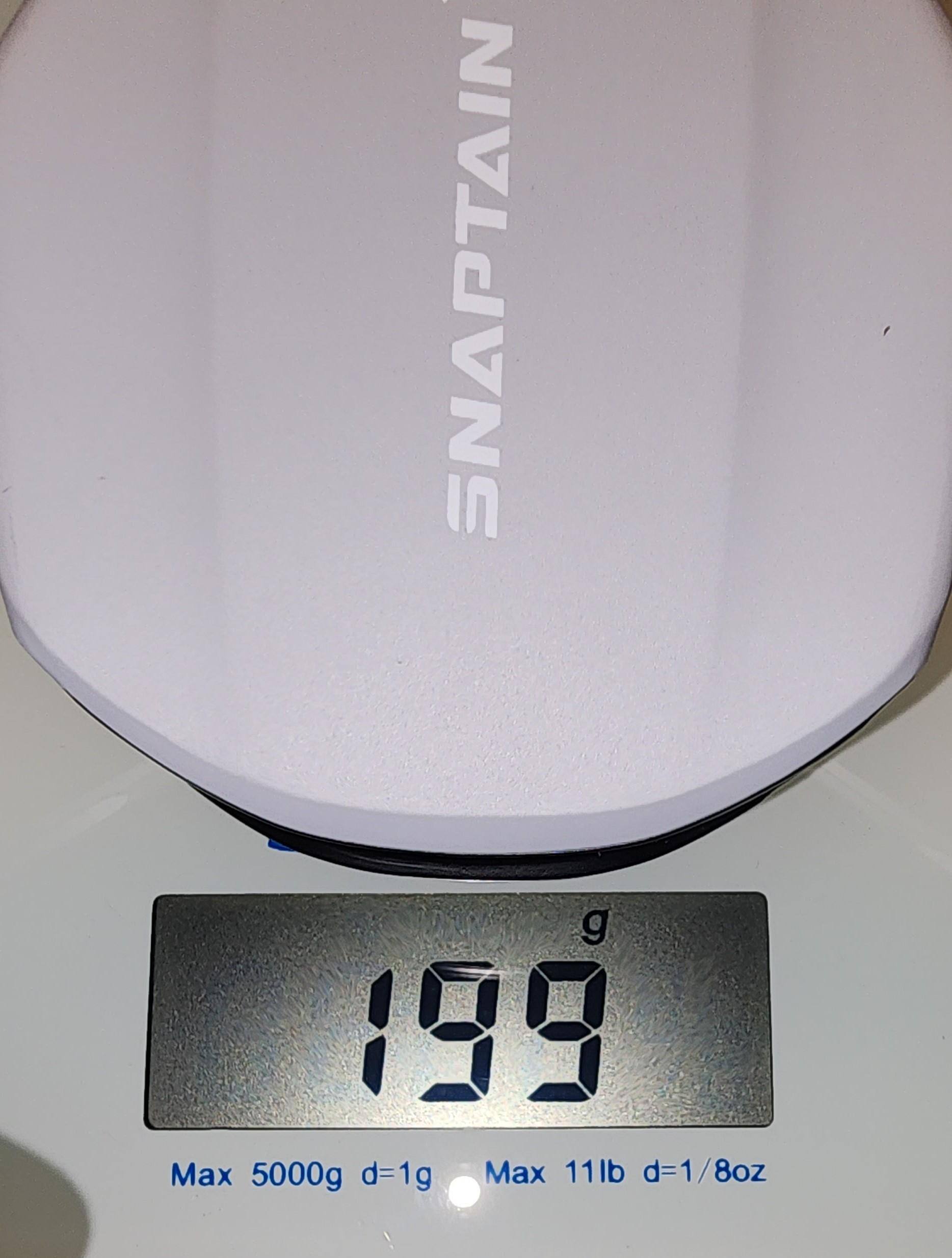 Drone with battery and SD card on scale, showing 199 gram weight, click to load a larger version