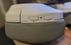 The right ear cup. Bluetooth button and power button with LED indicator light in-between., click to load a larger version