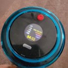 Captured particle count readout with size breakdown after 30 minutes of vacuuming hard floors and carpet, with remaining battery life runtime underneath., click to load a larger version