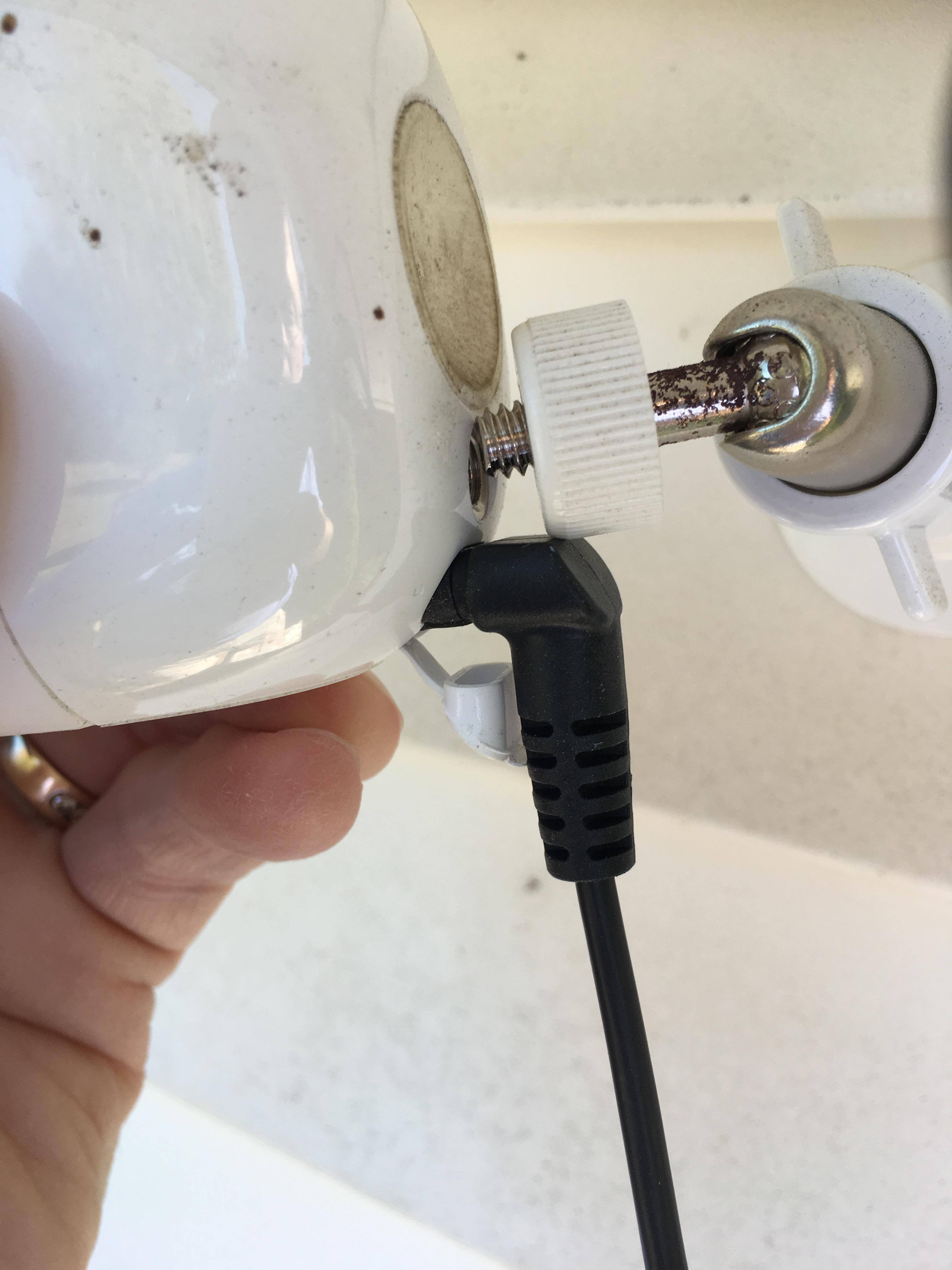 Interference between the retaining nut and solar power cord., click to load a larger version