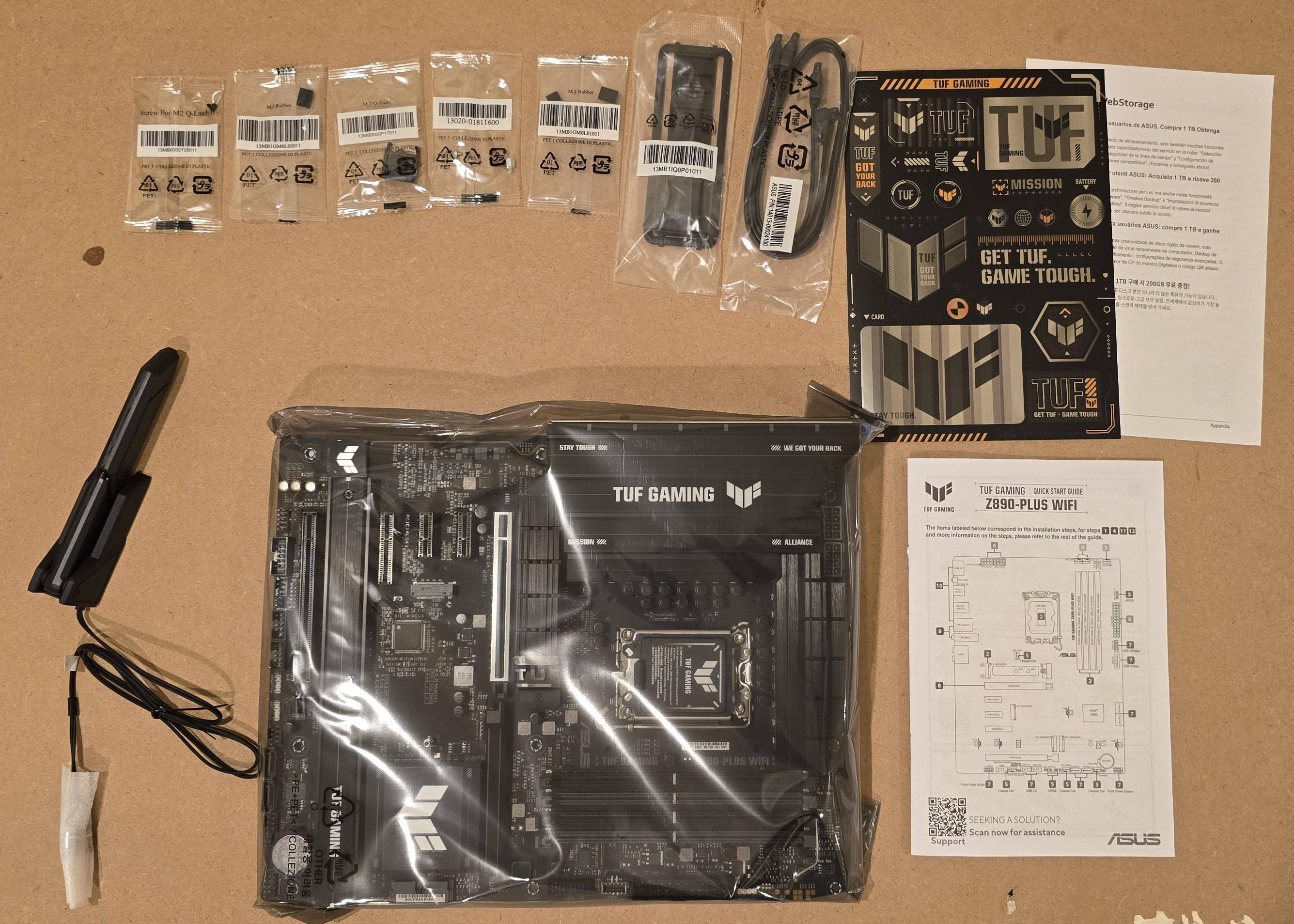 Everything that is included with the motherboard including the antennas and extra stickers, click to load a larger version