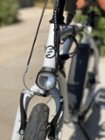 The front lamp is pretty useful in the evenings, but certainly be cautious with any night riding., click to load a larger version
